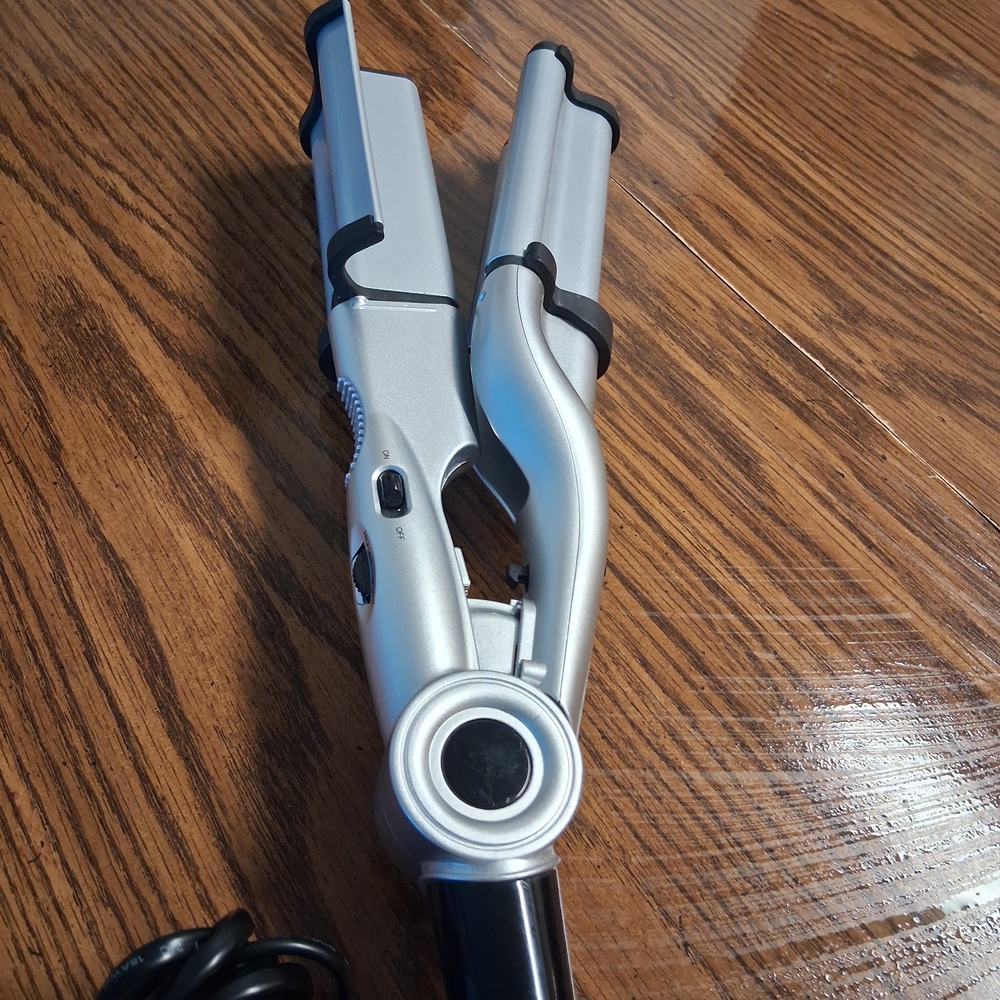 Sleek Silver Hair Styling Tool